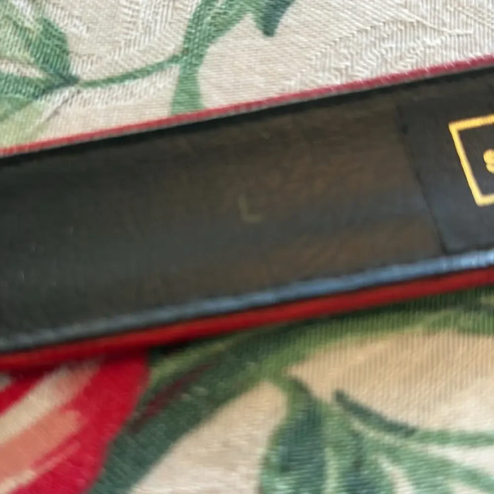Sandy Duftler vintage red belt with gold XX buckle